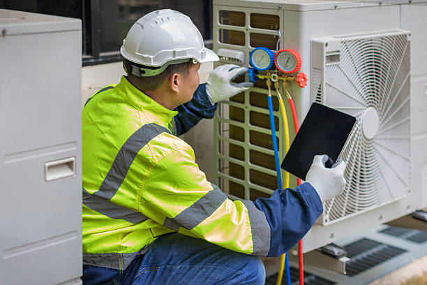Professional Air Duct Cleaning technician working in Island Lake, IL